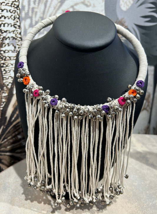 white ring with bells
